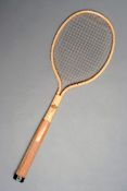 An American Dayton `Cadet` steel racquet late 1930s, cream coloured steel frame, metal stringing,