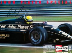 1985 Ayrton Senna-signed John Player Special poster, his large marker pen signature over an action