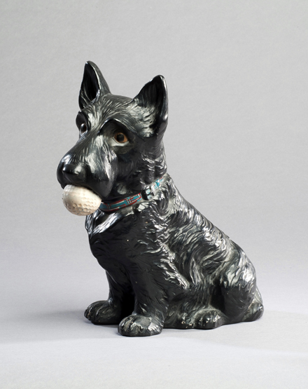 A pottery Scottie dog advertisement figure for North British Rubber Co. golf balls, in good,