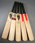 A collection of five signed cricket bats, comprising: a bat signed by the 1980 West Indies team to