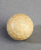 A scarce Dunlop `Stud` rubber core ball with unusual raised disc cover pattern, early 20th