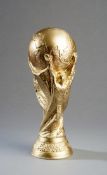 A replica of the World Cup trophy manufactured at the time of the 2002 World Cup a gilt plaster