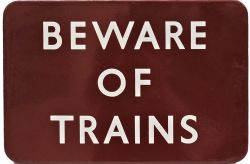 BR(M) Enamel Sign "Beware of Trains". Measures 18" x 12", F/F. Very good condition with some