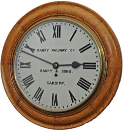 Barry Railway 12 inch Oak cased iron dial fusee clock with a spun brass bezel manufactured for the