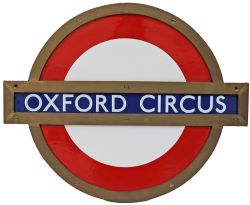 London Transport enamel Target, small size, OXFORD CIRCUS. Three separate pieces mounted within