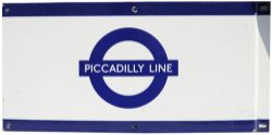 London Transport enamel sign PICCADILLY LINE, 20" x 9¾", white ground with dark blue stripe top