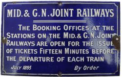 M&GN enamel, 8" x 5" white on blue. Text reads:- `MID.& G.N.JOINT RAILWAYS the booking offices at
