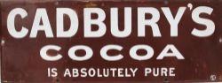 Advertising enamel Sign `Cadbury`s Cocoa Is Absolutely Pure`. White lettering on maroon ground.