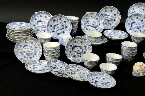 Ca Mau: Thirty landscape panel and trellis pattern tea bowls and saucers, circa 1725, painted in