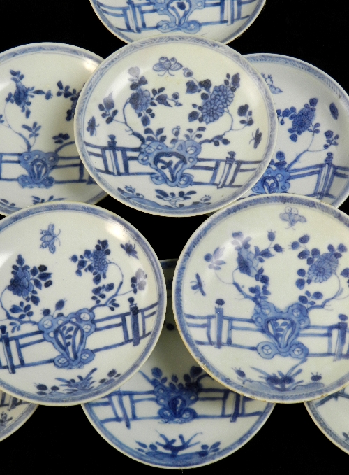 Ca Mau: Thirty rocks on a terrace pattern saucers, circa 1725, painted in blue with a peony and
