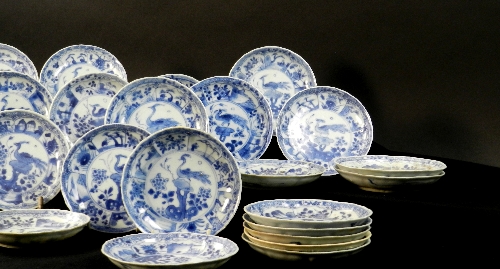 Ca Mau: Thirty peacock pattern saucers, circa 1725, each painted in blue with a peacock upon a