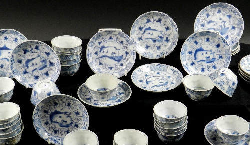 Ca Mau: Thirty landscape panel and trellis pattern tea bowls and saucers, circa 1725, painted in