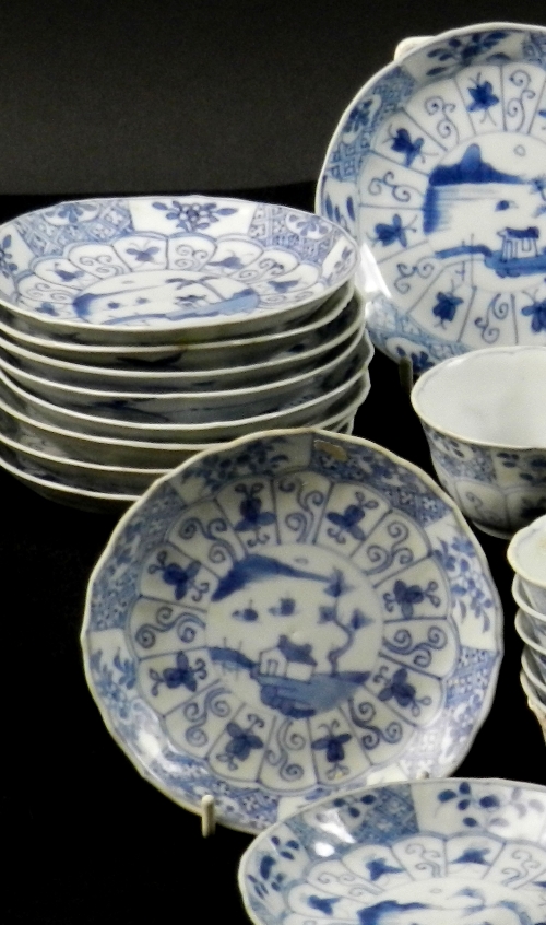 Ca Mau: Thirty landscape panel and trellis pattern saucers, circa 1725, painted in blue with an