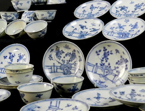 Ca Mau: Thirty rocks on a terrace pattern tea bowls and saucers, circa 1725, painted in blue with