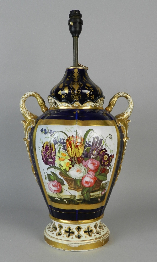 An impressive English porcelain vase and cover, circa 1820, well painted with a basket on a ledge