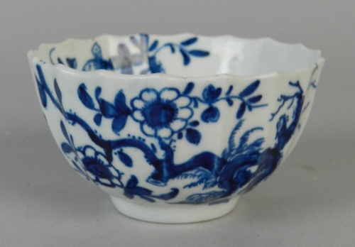 An early Worcester 'Prunus Root' pattern blue and white fluted tea bowl, circa 1760, painted