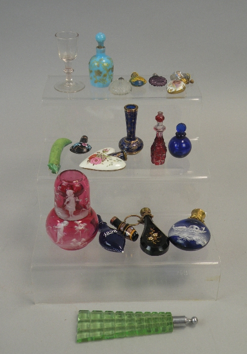 A small collection of scent bottles, perfume bottles, and novelties to include; a Venetian blue
