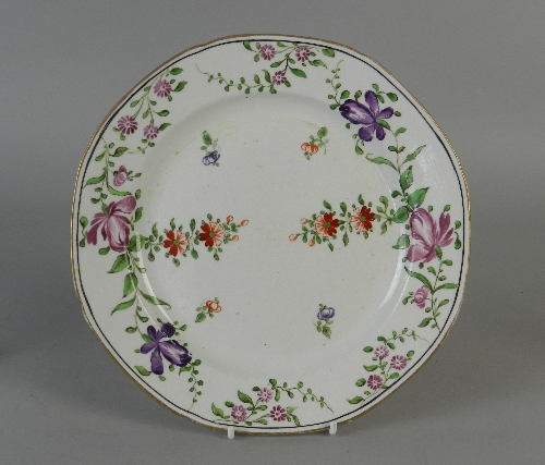 A Miles Mason plate, circa 1805, bearing an attractive design of enamelled purple, pink and red