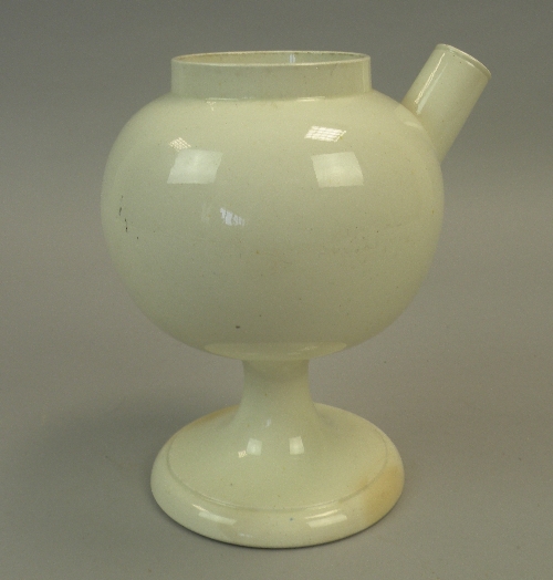 A rare English creamware Apothecary's Syrup Jar, late 18th century, with spherical body, tubular