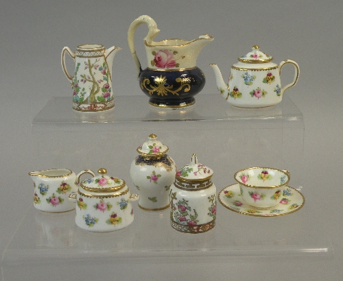 A collection of miniature jugs and vases to include an early 19th century pearlware barrel shaped