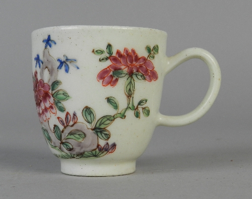 A Bow coffee cup, circa 1755, painted in enamels in the Chinese style with peonies and other flowers