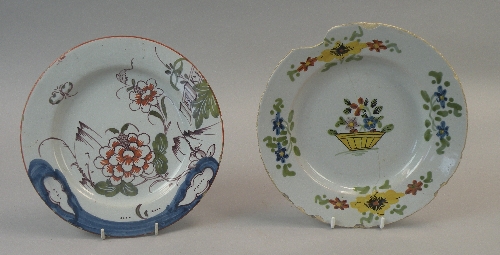 Two English delftware polychrome plates, circa 1760-70, one painted with a winged insect hovering