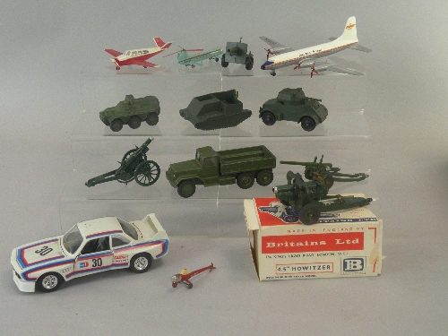 A group of unboxed diecast toys by Dinky, Corgi, Britains and Crescent.  Items include; a Dinky Toys