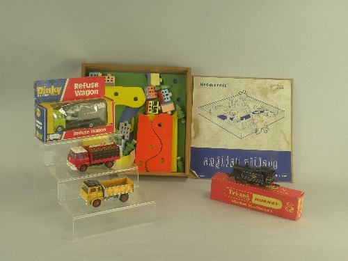 A mixed group of toys to include three Dinky Toys Bedford Lorries, the first a boxed No.978 Refuse