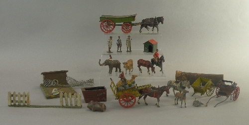 A quantity of agricultural figures by Britains dating from the 1930s, items include; a heavy cart