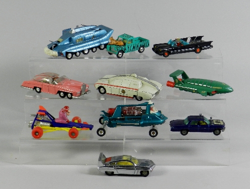 A group of ten unboxed Dinky and Corgi television and film related models, items include a Man