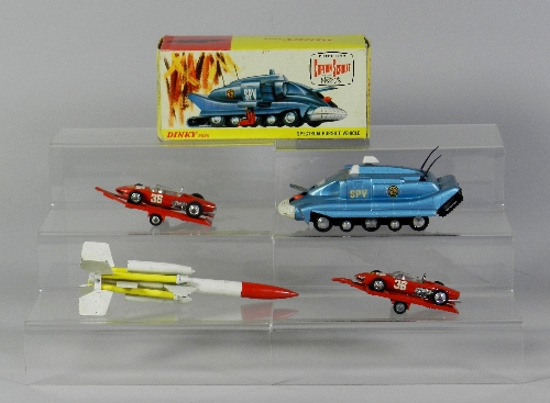 A boxed Dinky Toys No.104 Spectrum Persuit Vehicle (at fault) also to include two Ferrari F1 '