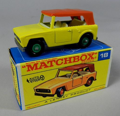 A Matchbox No.18 boxed Field Car, the model in yellow with cream interior and tan canopy, this model