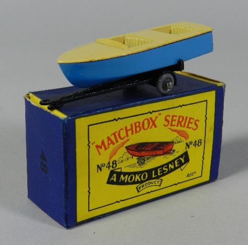 A Matchbox Series No.48 Speedboat and Trailer, the model with unusual grey plastic wheels