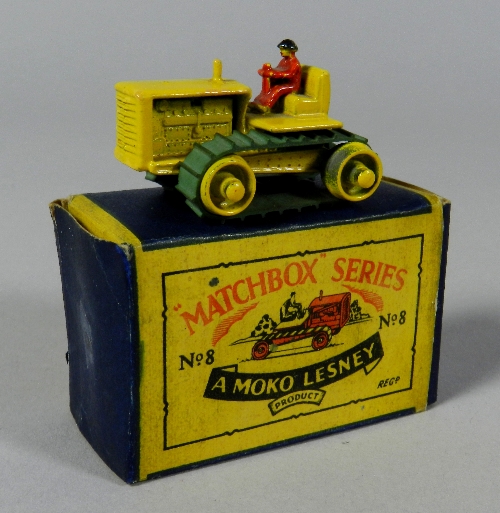 A Matchbox Series No.8 Caterpillar Tractor, the model in yellow with yellow rollers and axles with