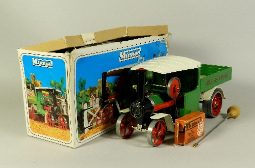 A boxed Mamod steam wagon, the model in cream and green livery is complete with steering rod, filler
