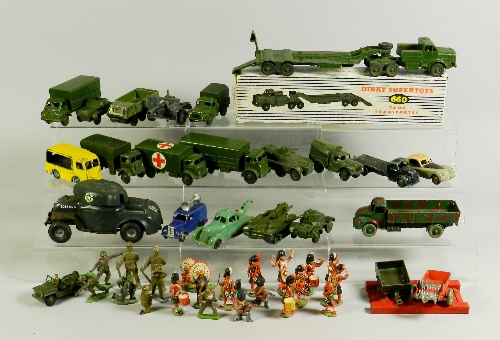 A quantity of approximately twenty four Dinky vehicles mainly Army types, models include a boxed