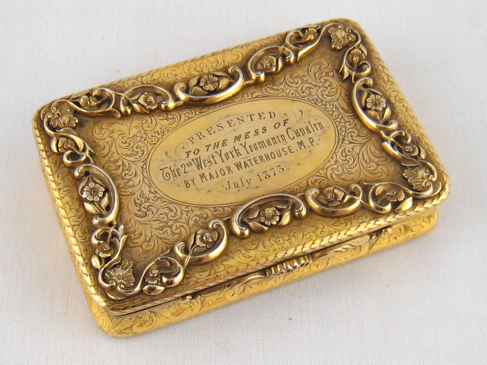 A very heavy silver gilt regimental box with incurved sides and rounded corners, the whole