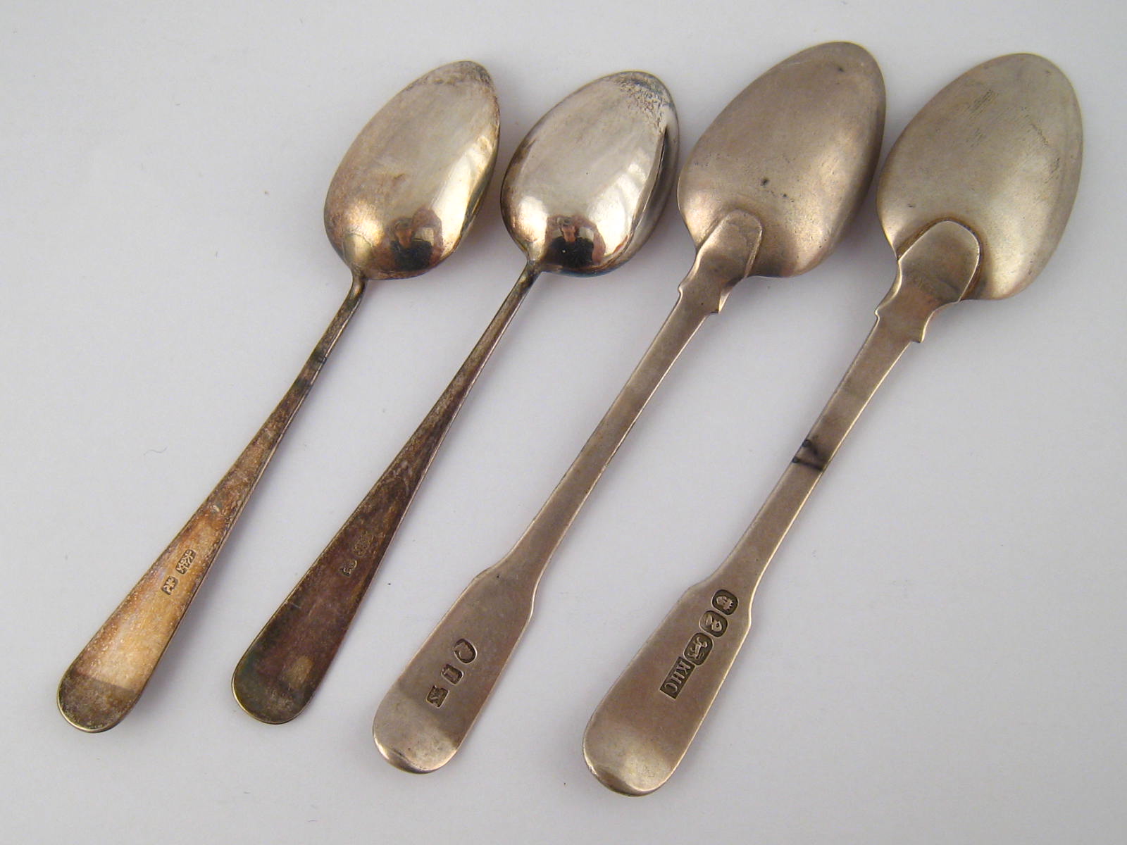 Chinese Export silver. Two fiddle pattern teaspoons with pseudo English hallmarks, one Kheecheong,