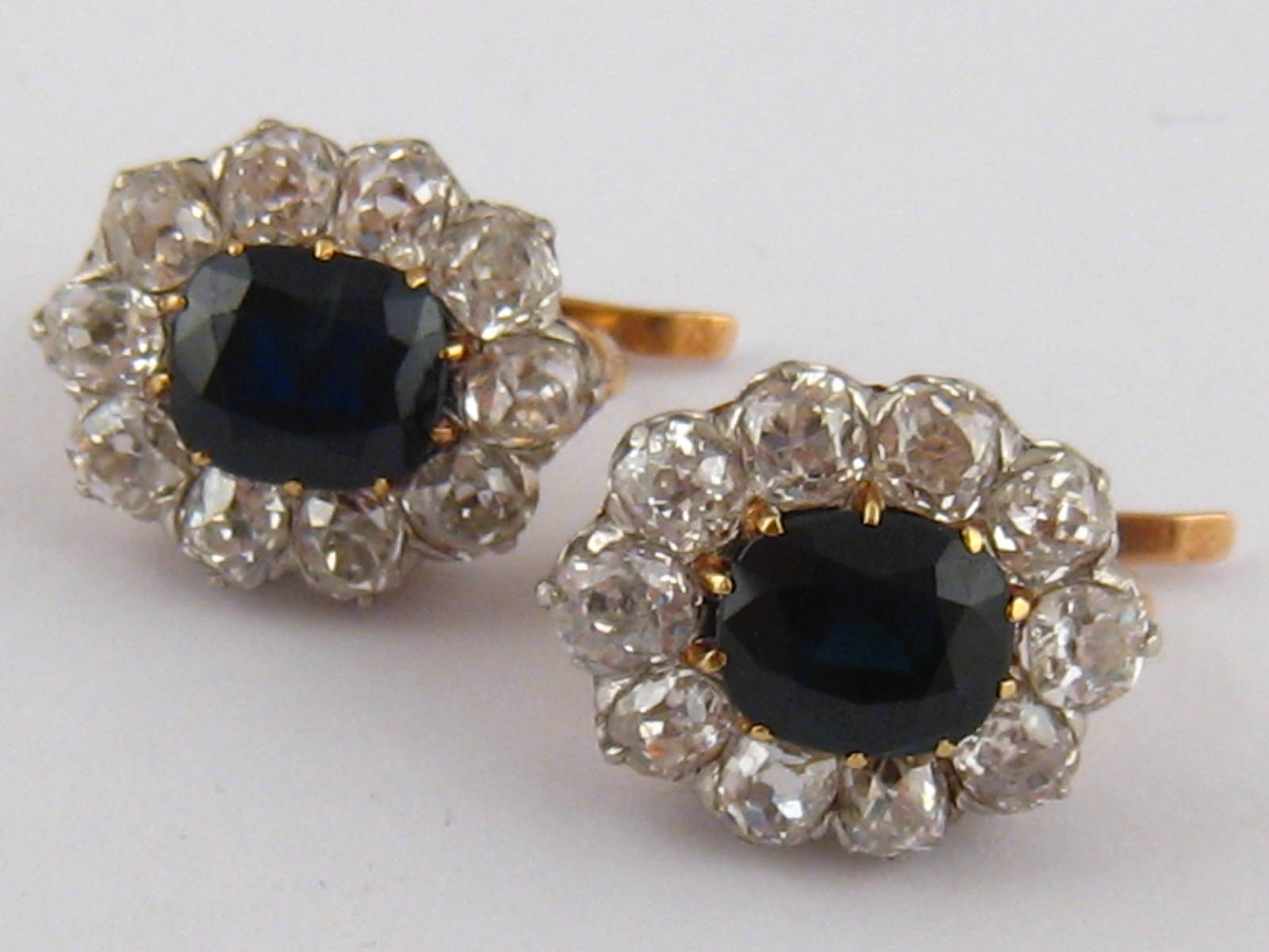 A pair of antique French hallmarked 18 carat gold sapphire and diamond earrings, the old brilliant