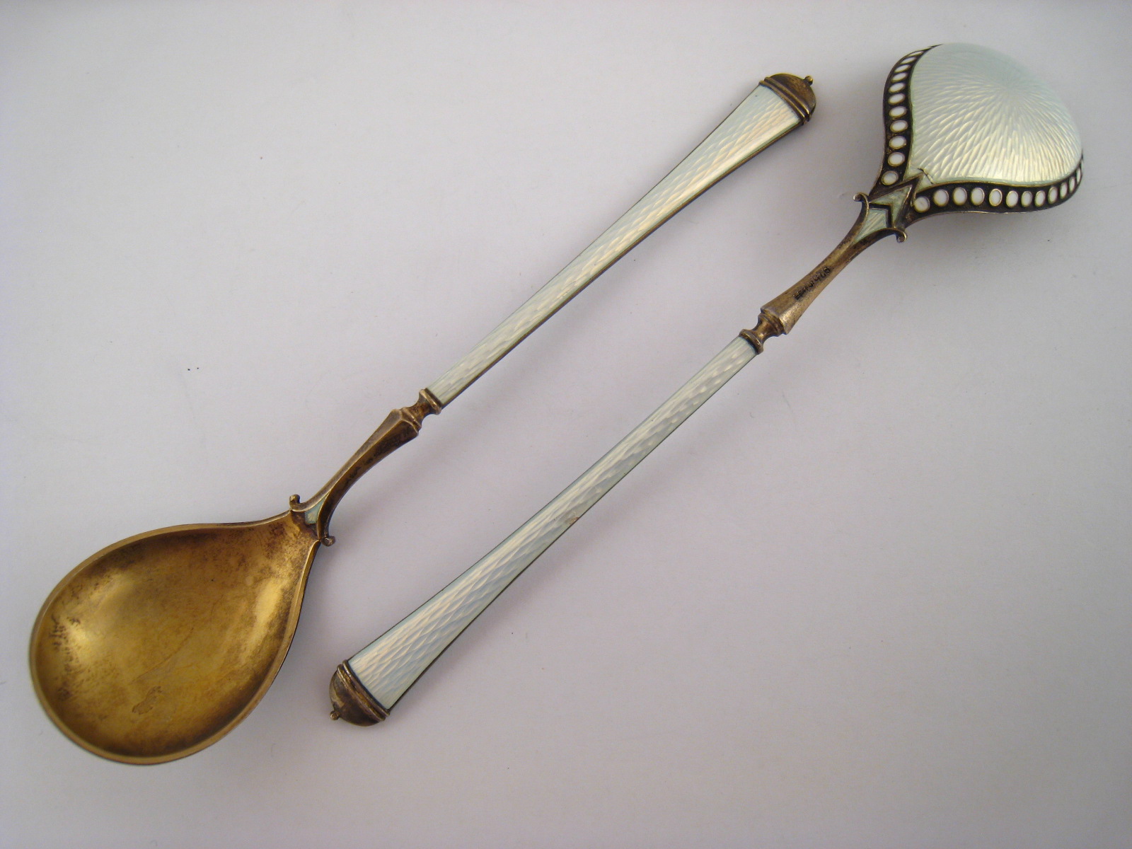 A pair of guilloche enamelled Norwegian silver spoons by Marius Hammer, approx. 15cm, 57.6 grams.