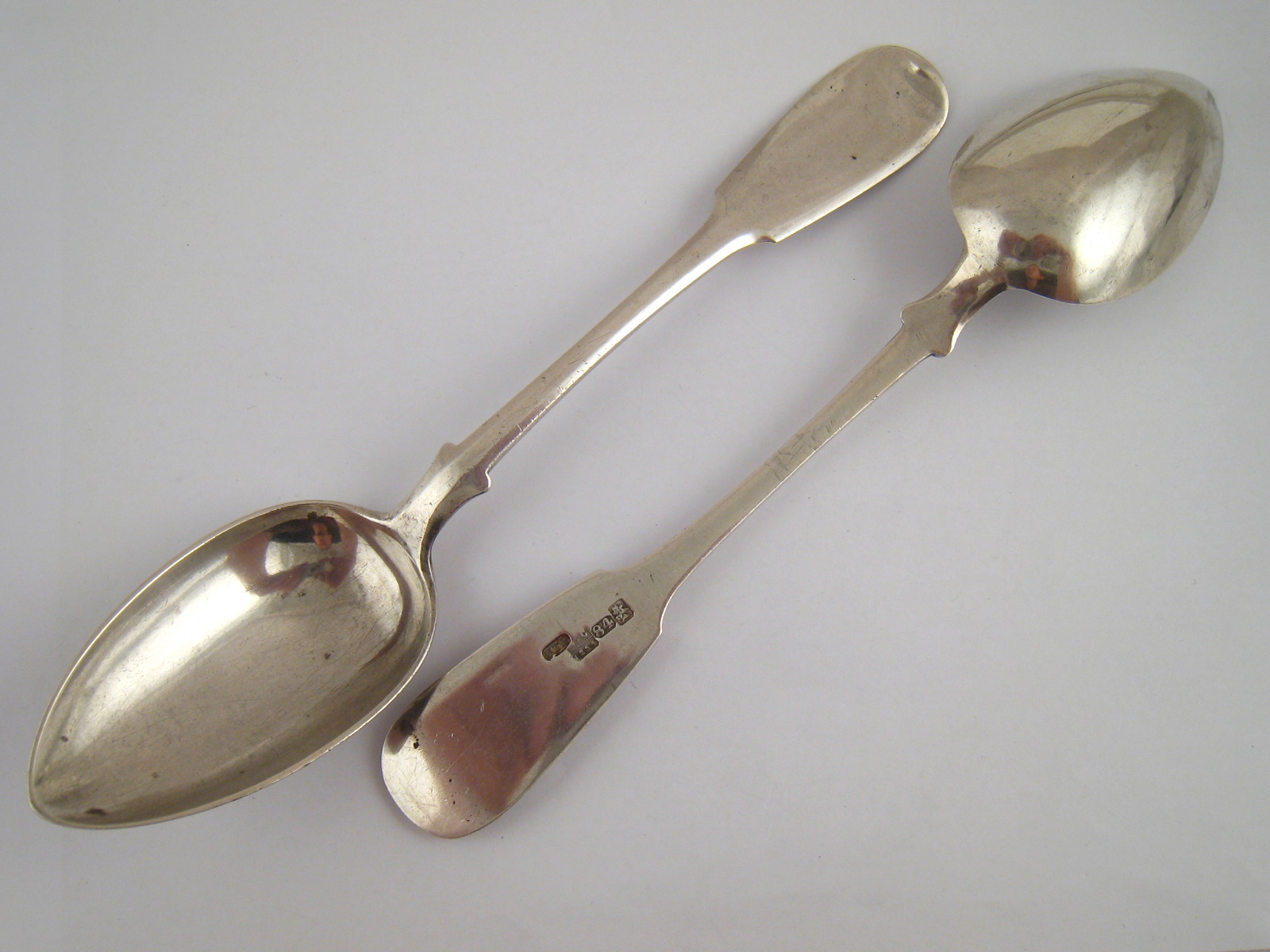 A pair of Russian silver table spoons, St. Petersburg 1865, approx. 150 grams.