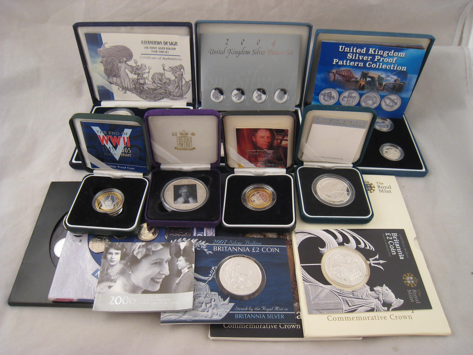 Uncirculated British coins, including 2007, 2008 sets, QEII and PoW crowns, 2007, 2008 Â£2 , 4oz