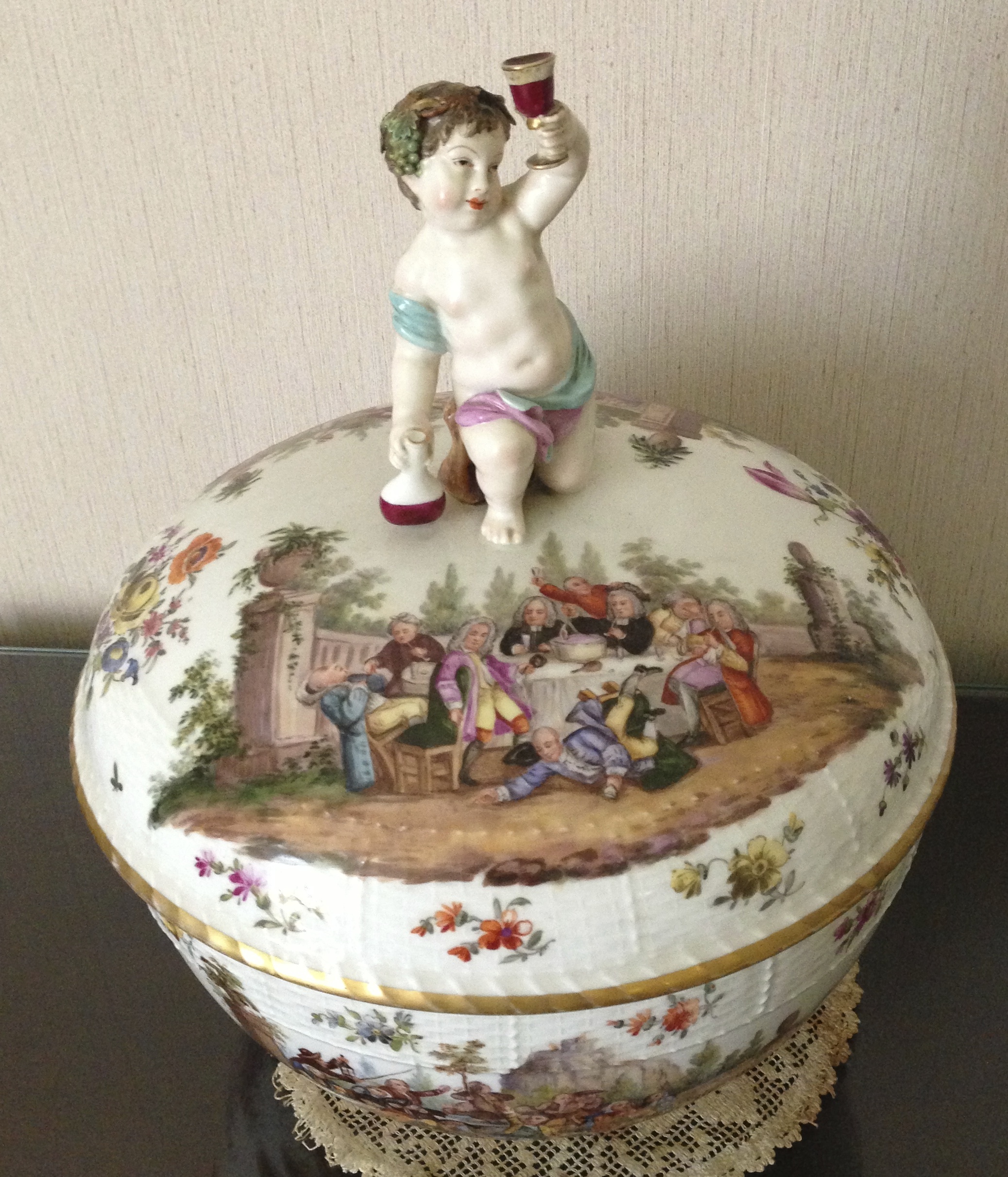 Fine quality Nineteenth century Meissen bowl and cover with cherub handle.