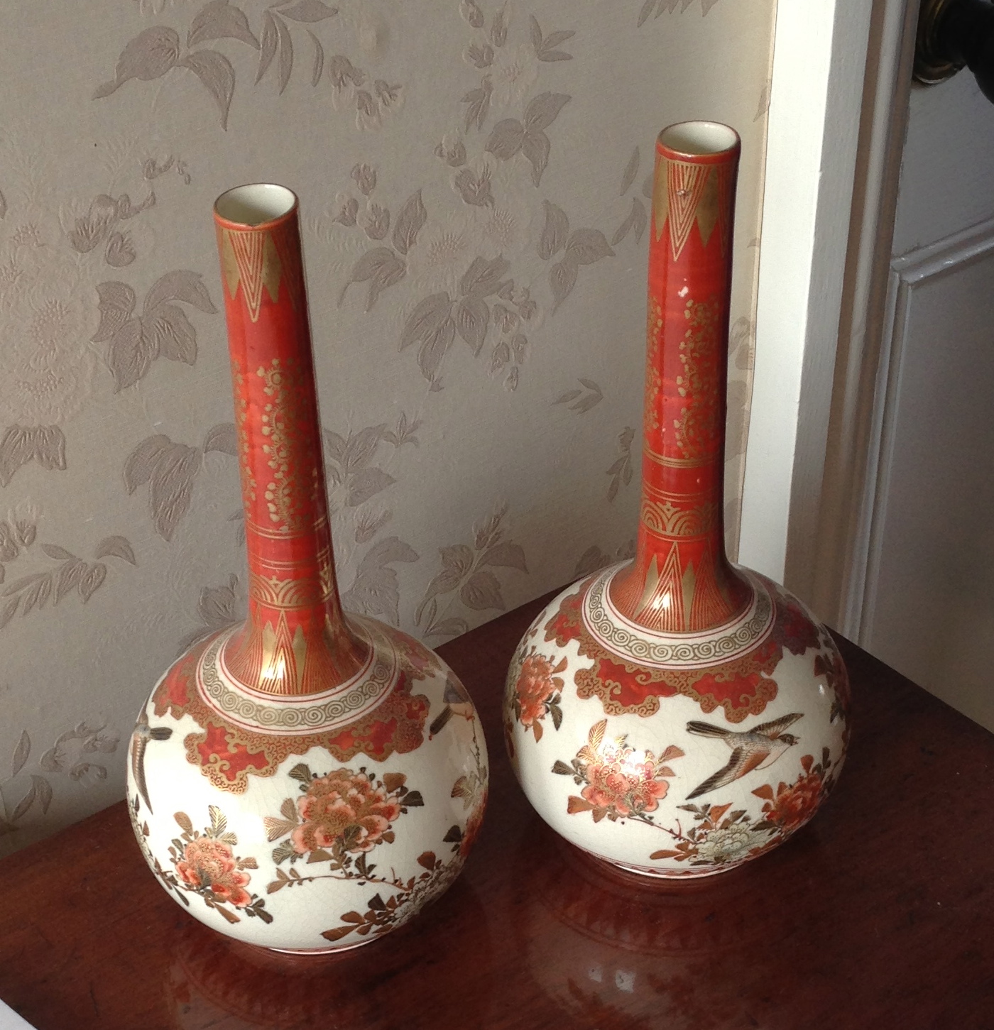 Pair of Japanese Satsuma ware vases 24cms high.