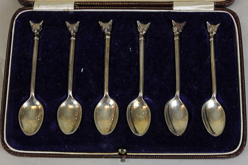 A set of six `Fox` head handled silver tea spoons, maker S. Limited, Birmingham 1936 in case stamped