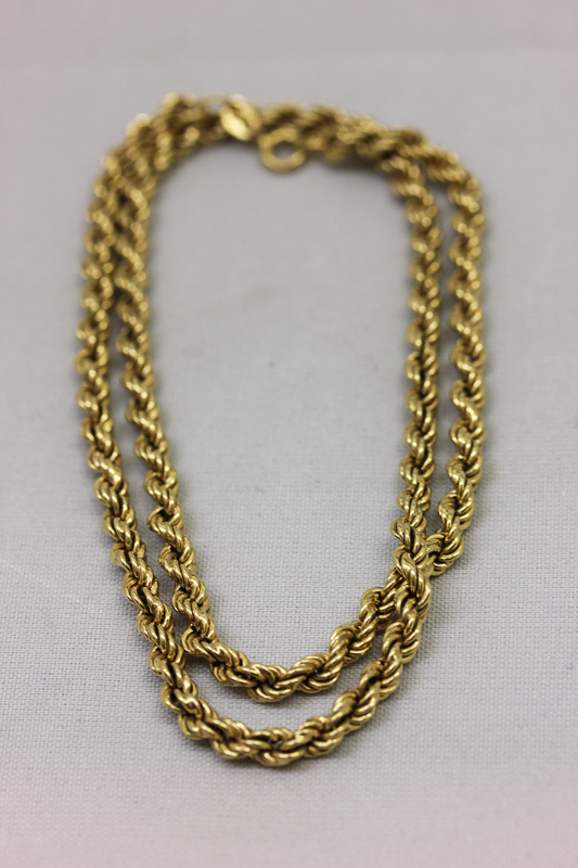 An 18ct gold ropetwist necklace with bolt ring clasp, 16gms