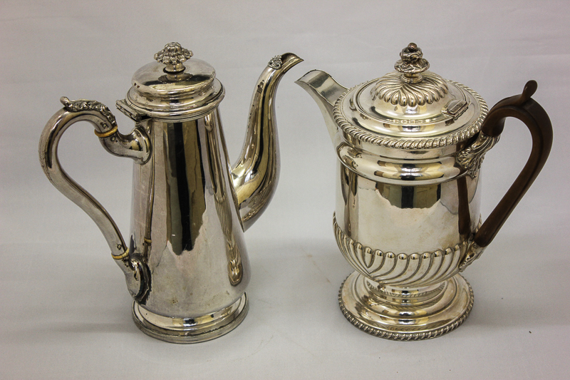 A plated 18th century style coffee pot; a plated hot water jug; a Britannia metal tea pot and two