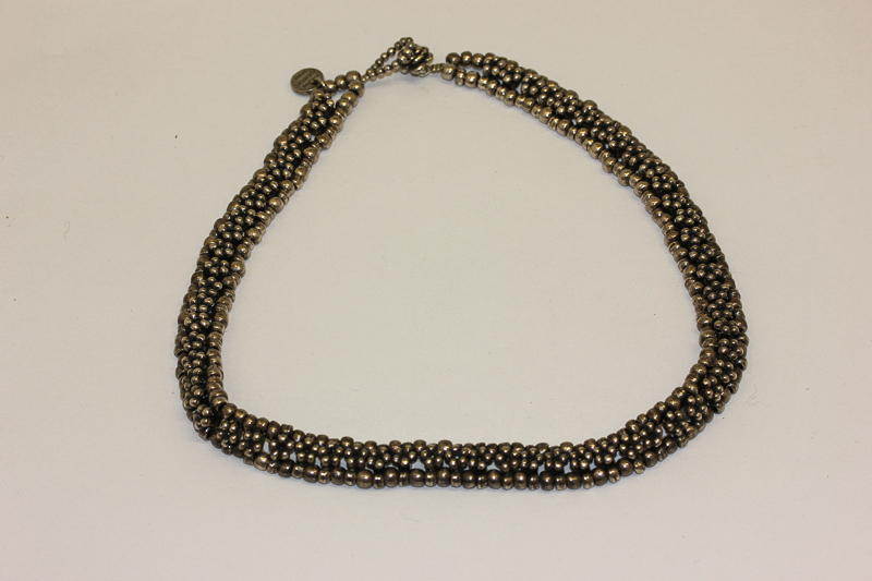 Philippe Audibert, a French silver necklace with bead cluster central row, 3.8gms gross