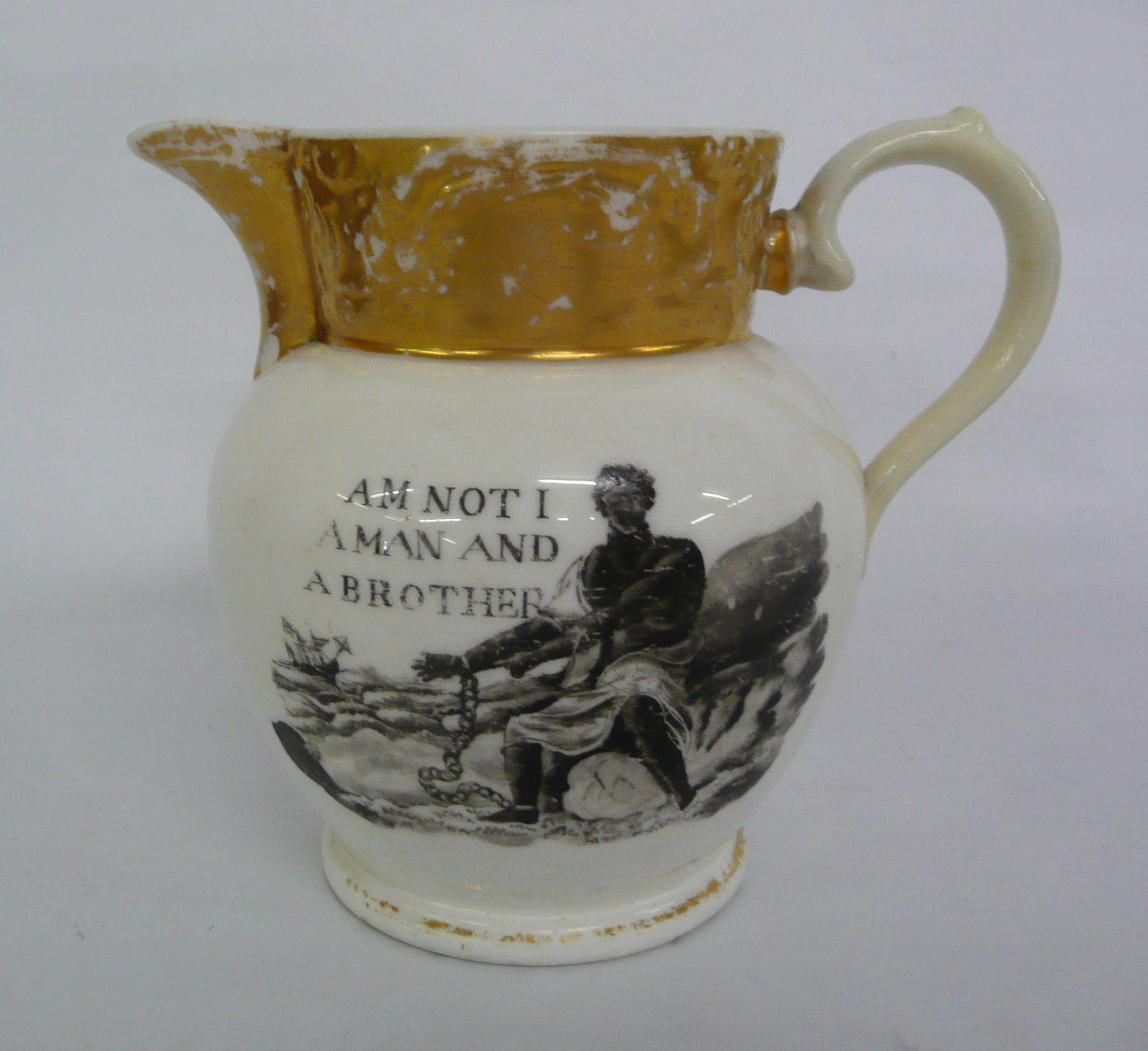 commemorate / commemorative  Anti-Slavery:  A very rare English porcelain jug, the scroll moulded