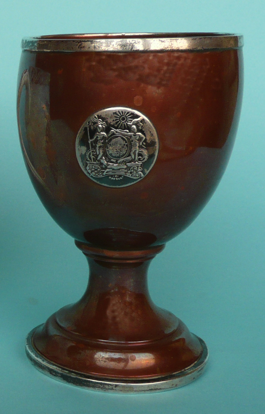 commemorative / commemorateAn interesting 20th century copper goblet with silver mounted foot, rim
